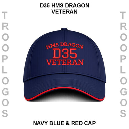A navy blue baseball cap with red embroidered text reading 'HMS DRAGON D35 VETERAN' on the front, shown on a white background with vertical gray side text and black caption text above and below.